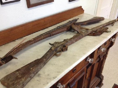 Two Civil-War era rifles were found in a pile of debris in a wall the demolition contractor was tearing down.