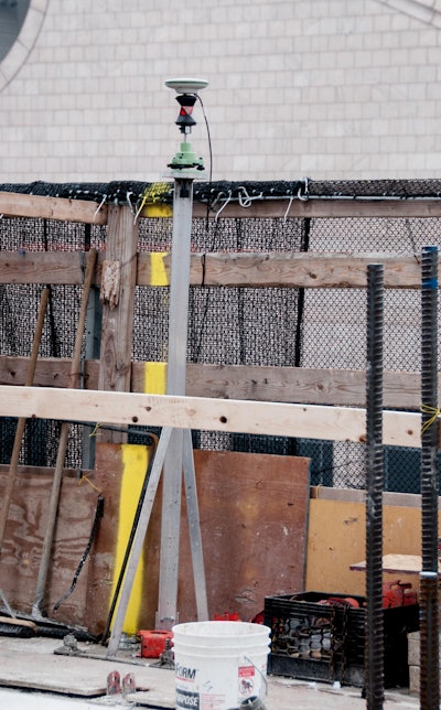 The GPS surveying instrument shown here allows engineers to layout horizontal and vertical geometry for the building even if the structure is moving back and forth.