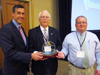 The New Hampshire DOT is honored with FP2 Inc.’s James B. Sorenson Award for Excellence in Pavement Preservation. At Nov. 12 presentation are, from left, NH DOT Commissioner Chris Clement; FP2 executive director Jim Moulthrop; and Eric Thibodeau, chief, pavement management for NH DOT.