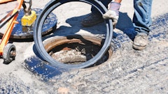 An FJ Turner adjustable riser being places during a City of San Diego overlay project.