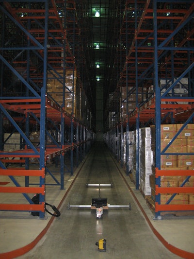 Pictured is the F-min Profiler in an operational freezer to show how working lift truck wheel paths are emulated. The temperature in the freezer is -4 degrees F.