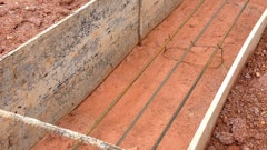 Herbert Construction Co. uses a plastic footing forming system to prepare this footing for concrete placement.