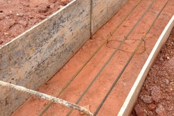 Herbert Construction Co. uses a plastic footing forming system to prepare this footing for concrete placement.