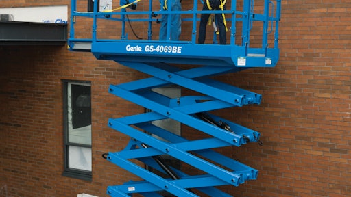 The Genie GS-4069 hybrid scissor lift keeps itself charged and can supply full AC power when onsite power is not available. It can also switch to hybrid or electric to meet rough-terrain or indoor slab environments.