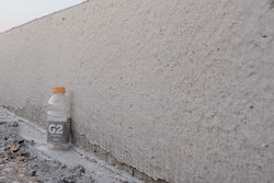 The GOMACO edge on the airport's new 17-in.-thick runway.