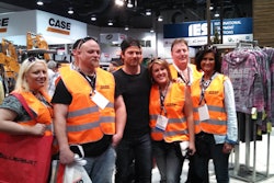 Country artist Kip Moore (center) poses for pictures following the press conference announcing his partnership with CASE.