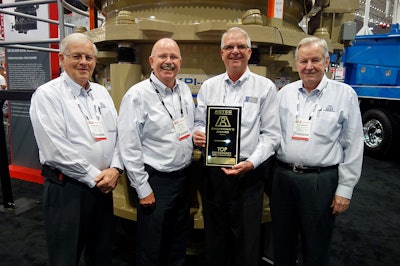 From left to right: Norm Smith, vice chairman of the board for Astec Industries; Joe Vig, group president of KPI-JCI and Astec Mobile Screens; Jeff Elliott, president of Johnson Crushers International (KPI-JCI and Astec Mobile Screens; and Dr. J. Don Brock, founder and chairman of the board for Astec Industries.