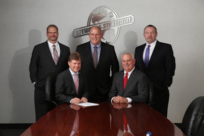 Left to right (standing): Alan Kurus, Vice President Sales, Atlas Copco Construction Equipment; Andy Hudson, Vice President, Stevenson & Stevenson of Rental Operations; Michael Masters, Vice President Stewart & Stevenson Central District. (Seated): Erik Sparby, GM and President, Atlas Copco Construction Equipment; Bill Simmons President and CEO Stewart & Stevenson Distribution.