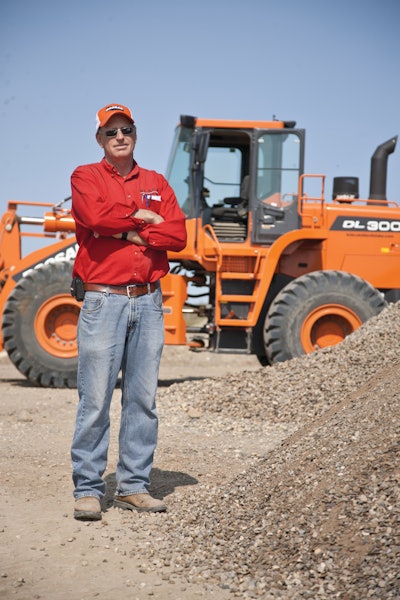 According to Dean Black, Black Construction, the Doosan DL300 loader provides the bucket capacity, traction, horsepower and quickness the company needs to keep the loading process in its aggregate pit moving forward.