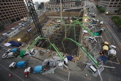 During the massive pour, 12 Putzmeister truck-mounted concrete boom pumps ranging from 32Z-47Z Meters, two Putzmeister placing boom towers, and two Putzmeister trailer-mounted concrete pumps were strategically placed both inside and above the excavation.
