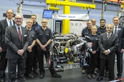 Perkins president Ramin Younessi, front right, joins representatives from across the business to celebrate the production of the 20 millionth Perkins engine.