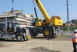 The Grove RT880E performed a variety of tasks including moving the highway’s barrier walls to set up lane structures and construction zones.