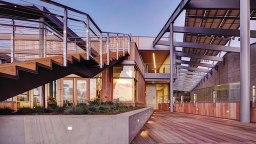 The JCVI facility consists of a three-story, 28,600-square-foot office wing and a single-story, 12,605-square-foot laboratory wing. The laboratory and office wings are perched atop the roof/podium deck of the partially below-grade parking garage.