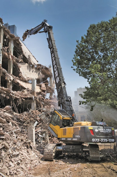 During the later stages of the project, crews worked up to 10 hours a day seven days a week, with the high reach doing 99 percent of the tear down work and a Volvo EC380D and EC360C with grapples partnering to separate and scoop debris into hauler trucks.