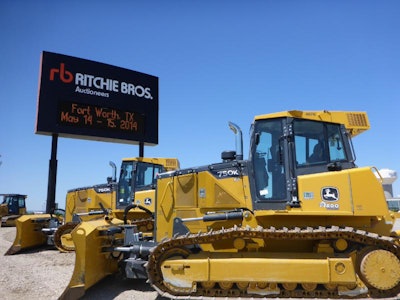Two of eight 2013 John Deere 750K XLT crawler tractors featured at the upcoming Ritchie Bros. unreserved public auction in Fort Worth, TX. (PRNewsFoto/Ritchie Bros. Auctioneers)
