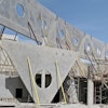 The project also included a combination of construction systems: tilt-up panels with slab design in two directions, tilt-up panels working as retaining walls with double-T beams, and tilt-up panels with concrete slabs in one and two directions.