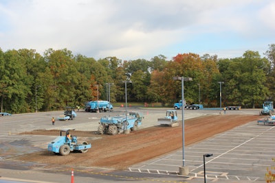 Depending on job size several facets of the full-depth reclamation process can take place simultaneously as happened at a Lockheed Martin parking lot where mixing, grading and compaction are getting done.