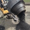 The SkidPatcher10A recycles old asphalt millings into a 300 degree F hot mix that is ready for laydown in just 10 minutes.