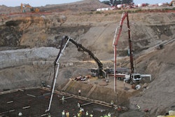 Located in a 100-ft.-deep hole, the large foundation of an iron ore collection pit challenged contractors to develop a strategic plan for pumping concrete a distance of 600 ft.