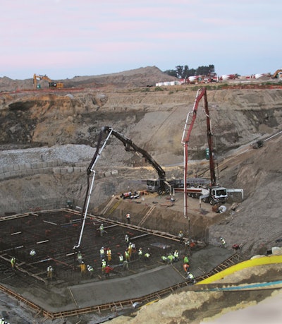Located in a 100-ft.-deep hole, the large foundation of an iron ore collection pit challenged contractors to develop a strategic plan for pumping concrete a distance of 600 ft.