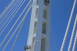 Spider’s experienced engineers also designed a custom platform to reach around the exterior of the tower shaft. The equipments’ light weight and easy connections enabled American Bridge/Fluor Joint Venture to change the platform’s length as needed to gain better access to the sloping tower face while maximizing the working space on the platforms to maintain productivity.