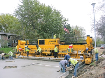 The Windom, MN, project involved 150 box-outs for manholes and intakes, which had to be set them on the fly to maintain access for the concrete trucks.