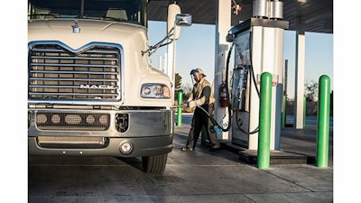 A driver fuels a Mack Pinnacle Axle Back model. To help customers maximize their ROI, Mack announced it's now working with an organization to help navigate the grant process to obtain funding for alternative fuel- and clean diesel-powered vehicles.