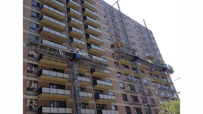 The demolition crew on the project included five men on a mast climber along with the Brokk 50 machine. One man operated the machine and the other moved debris and prepared the steel joists.