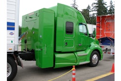Kenworth produces this natural-gas T680 with back-of-cab gas storage unit that holds more than 120 diesel-gallon equivalents of gas. Systems specced by customers in the T880 or T680 can limit tanks to frame rails or use a smaller back-of-cab box.