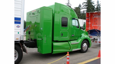 Kenworth produces this natural-gas T680 with back-of-cab gas storage unit that holds more than 120 diesel-gallon equivalents of gas. Systems specced by customers in the T880 or T680 can limit tanks to frame rails or use a smaller back-of-cab box.