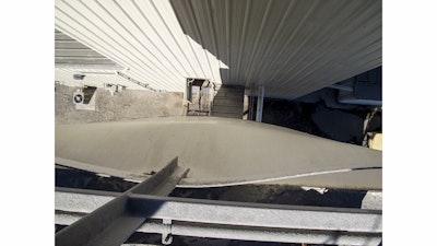 The severity of the material build-up became apparent to system operators when they noticed the walls of the silos starting to bulge outward from over-pressurization.