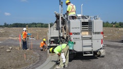 There was six miles of curbs throughout the development that TACC carved out and fine graded them with 3/4-inch stone as prep for the asphalt paver and placed the concrete curb and gutter using its Power Curber 5700-C with Topcon Millimeter GPS machine control.