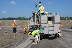 There was six miles of curbs throughout the development that TACC carved out and fine graded them with 3/4-inch stone as prep for the asphalt paver and placed the concrete curb and gutter using its Power Curber 5700-C with Topcon Millimeter GPS machine control.