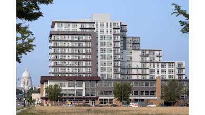 This mixed-use property is anchored by more than 32,000 square feet of commercial space on the first three floors and topped by 220 high-end apartments on the top eight floors above a 275-stall parking garage.