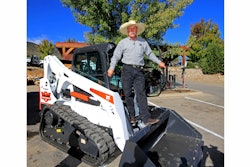 Bobcat's One-Millionth Loader contest winner Steve Klumker with his new Special Edition One-Millionth Bobcat T650 compact track loader.