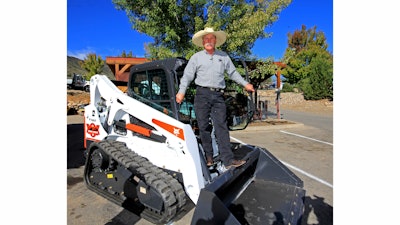 Bobcat's One-Millionth Loader contest winner Steve Klumker with his new Special Edition One-Millionth Bobcat T650 compact track loader.