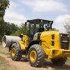 Mid-sized wheel loaders such as the Kawasaki 67Z7 are compact enough to maneuver on tight construction sites, while providing the power required to handle a variety of tasks.