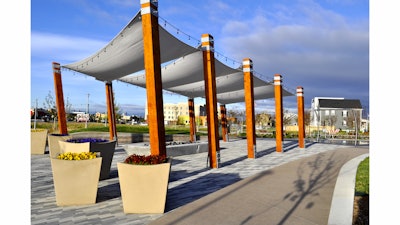 Conservatory Green is the focal point for the Stapleton Denver redevelopment project. The project featured Lithocrete sedimentary landform walls, Sandscape planters and more.