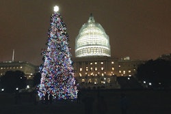 Aaron Urban, a 10-year-old from Maryland, lights the U.S. Capitol Christmas Tree at a special ceremony at the U.S. Capitol. Urban was diagnosed with a brain tumor four years ago, and it was his wish to light the Capital tree.
