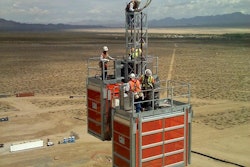 Work to jump the hoists in progress. The unique design of the mast made it possible to meet the challenging conditions of the jobsite.