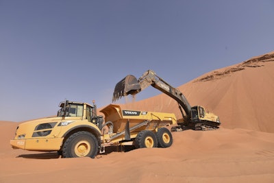 The construction team worked 14-hour shifts excavating and depositing sand that was then compacted using naturally salty ground water.