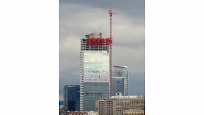 Both cranes are climbing at a rate of 49 feet per month and set to reach final working heights of 918 feet.