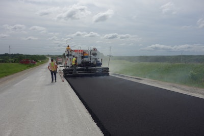 Norris Asphalt Paving had an 11-person crew on the six-week Iowa Highway 92 project, which began at the end of May 2014. The company was responsible for the paving portion of the highway rehab.