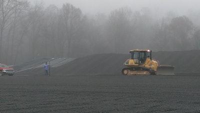 The 24-in. layer of leachate collection stone was the last layer, which was placed on top of 60-mm-thick High Density Polyethylene (HDPE) sheet.
