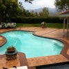 This pool deck was restored to its original brilliance using the Original Solid Color Stain and Translucent Enhancer from NewLook International.