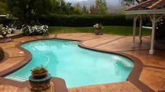 This pool deck was restored to its original brilliance using the Original Solid Color Stain and Translucent Enhancer from NewLook International.