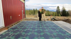 Julie & Scott Brusaw in front of their Solar Roadway parking lot prototype.