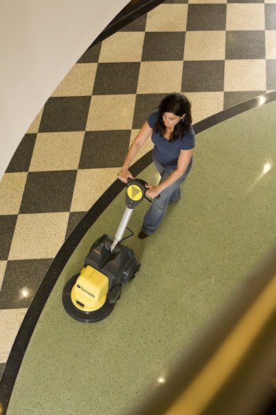 A burnisher is a high-speed floor machine used to polish and clean floors. Pictured is the Battery Glazer 17 floor machine that operates on green batteries instead of a standard power cord.