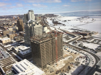 Because of the building's height, Veit had to develop a plan to surgically remove the building, floor by floor, down to a level where the crew could safely remove the remaining portions of the building using heavy equipment.