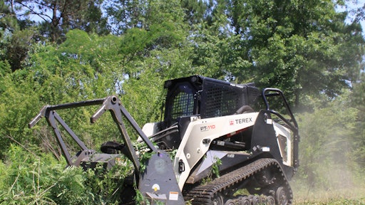 Surgical Land Clearing uses a 111-hp Terex PT-110 Forestry compact track loader with a Loftness brush cutter attachment to cut through undergrowth and trees up to 8 in. in diameter.